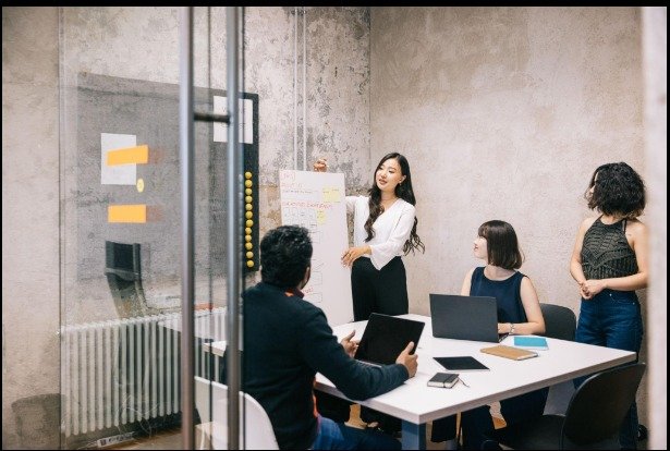 Professional digital marketing consultants discussing business growth strategies